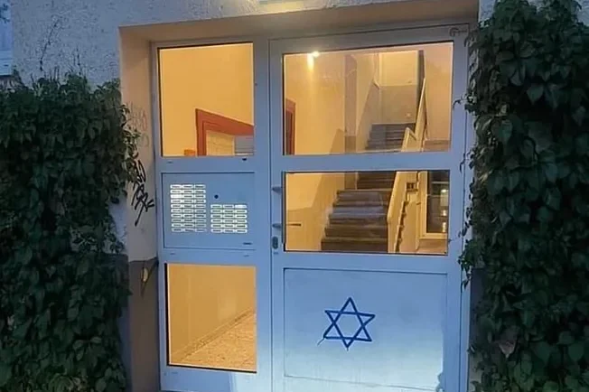 Graffiti outside an apartment building in Berlin.