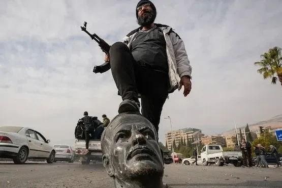 Opposition fighter celebrates the collapse of Assad’s government-India-Today Opposition fighter celebrates the collapse of Assad’s government-India-Today