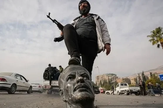 Opposition fighter celebrates the collapse of Assad’s government-India-Today